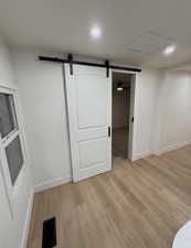 Locking Barn door that enters in to the large primary bedroom.