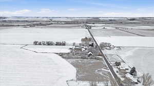 Overview of rural landscape featuring extensive farmland