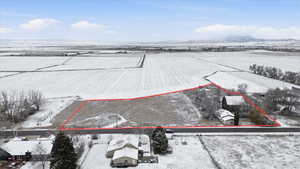 Overview of rural landscape featuring abundant farmland and property parcel outlined