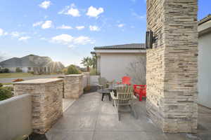 View of patio featuring outdoor dining area
