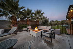 Fenced backyard featuring a patio and an outdoor living space
