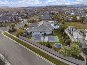 Aerial view of residential area featuring a mountain backdrop
