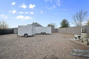 View of fenced backyard