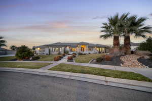 Prairie-style home with a front yard