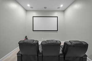 Cinema featuring carpet and recessed lighting