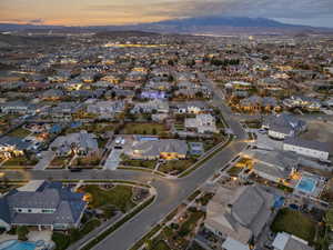 Aerial view at dusk of a residential view and a mountain view
