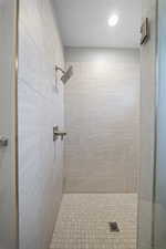Bathroom featuring a shower stall