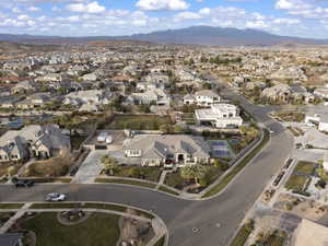 View of property location featuring nearby suburban area and mountains