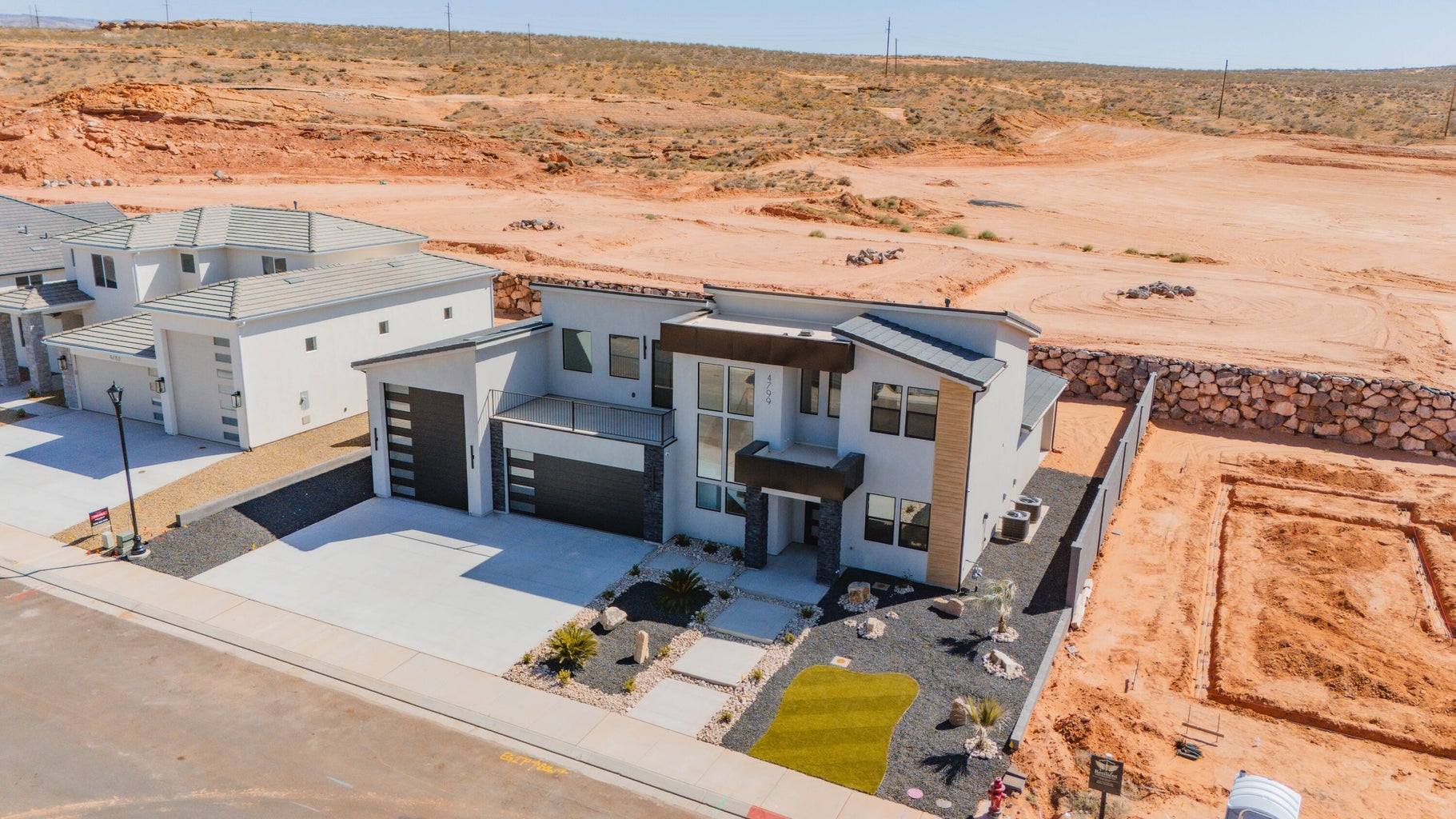 Aerial view of sparsely populated area with a desert landscape