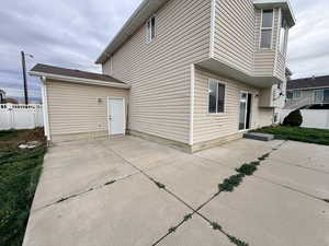 View of property exterior with a patio