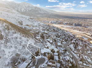 Snowy aerial view with a mountain view