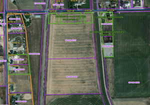 Aerial map of property and surrounding area featuring property boundaries highlighted