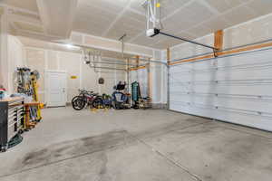 Sizeable garage perfect for storing multiple cars, tools, lawn maintenance and more!