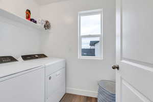 Upstairs laundry room offering a private space for laundry