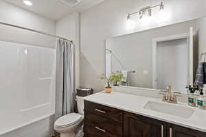 Full bathroom featuring vanity and shower / bath combo