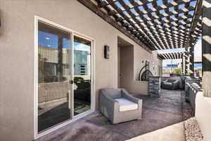 View of patio with a pergola