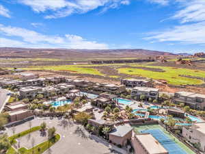 Drone / aerial view of a pool area and mountains