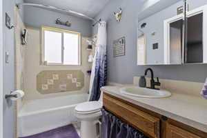 Full bath with vanity and shower / tub combo