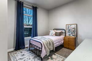 Bedroom featuring carpet floors