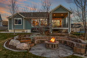 View of front of home featuring a patio area and a trampoline