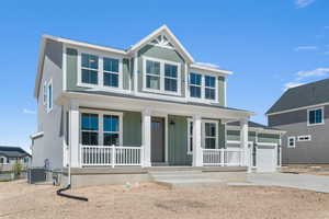 View of front facade with board and batten siding, a porch, concrete driveway, and a garage