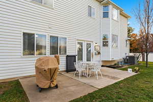 View of patio featuring area for grilling