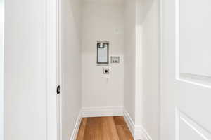 Laundry room featuring light wood-style flooring and washer hookup