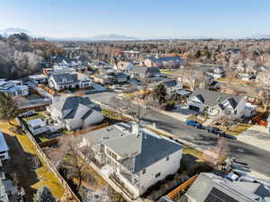 Aerial view of residential area with a mountainous background