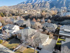 Aerial perspective of suburban area with a mountain backdrop