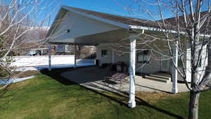 Back of property with a patio area