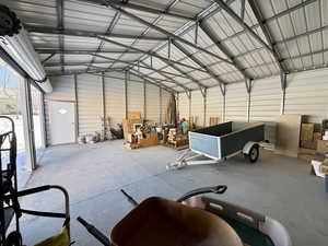 Garage featuring metal wall