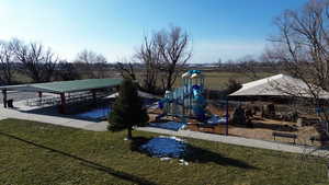 Dock area featuring a patio area and a yard