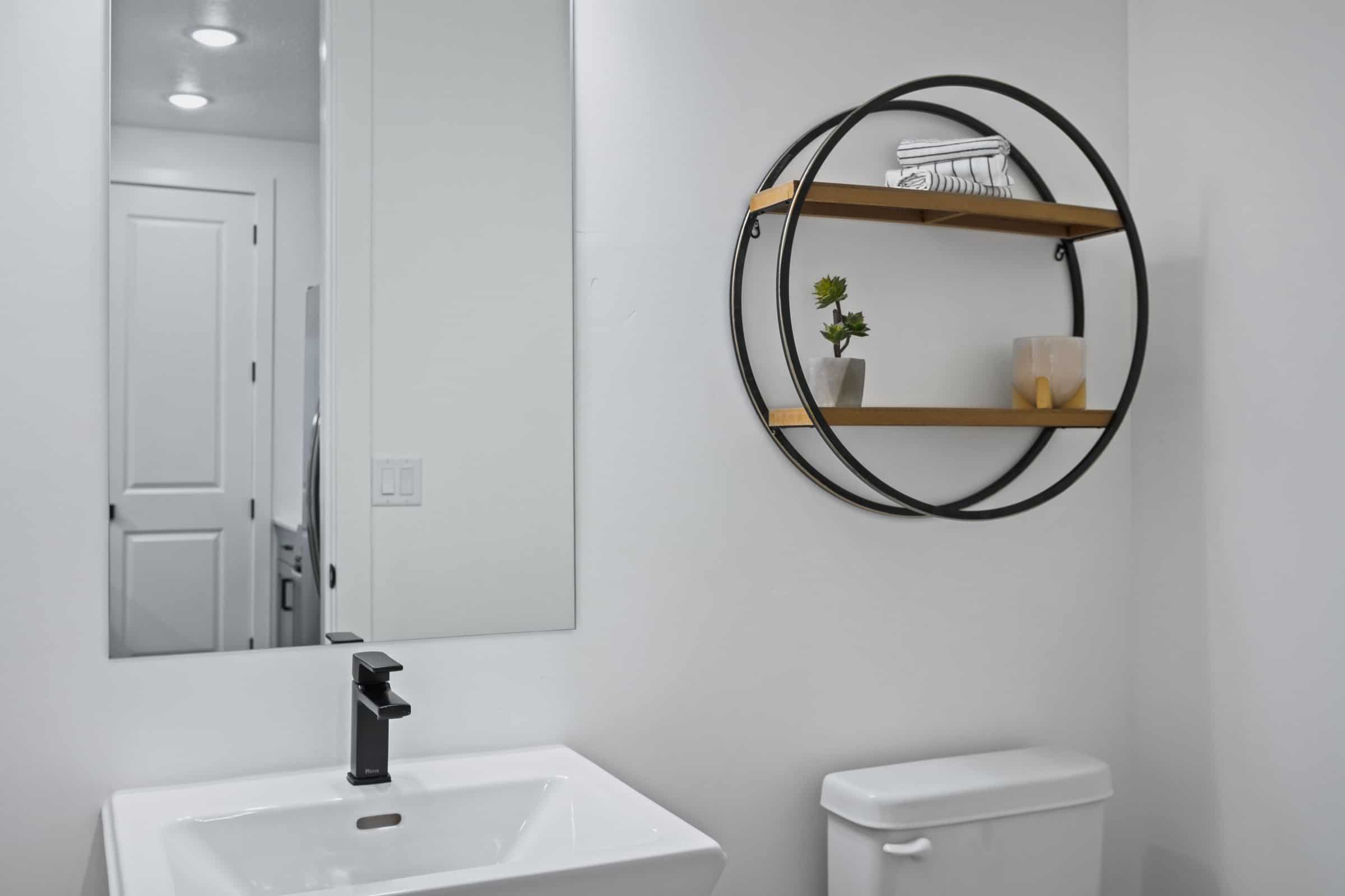 Half bath featuring a sink and toilet