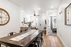 Dining space with light wood finished floors, a ceiling fan, and recessed lighting