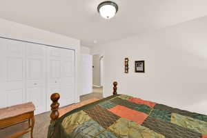 Bedroom featuring a closet and carpet floors