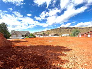 View of yard with a garage