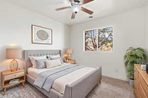 White walls frame a window overlooking mature trees
