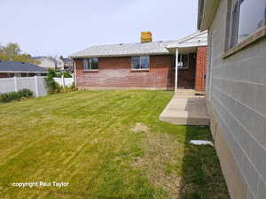 View of yard with a patio area