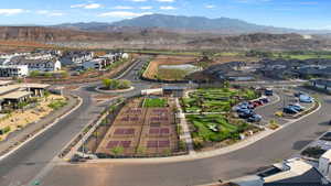 Aerial perspective of suburban area featuring a mountain backdrop