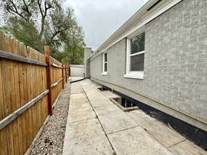 View of home's exterior featuring a fenced backyard