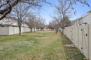 View of yard with a gate