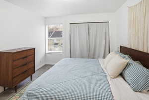 Bedroom with carpet flooring and a closet