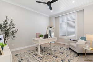 Home office featuring carpet flooring, ornamental molding, recessed lighting, and a ceiling fan