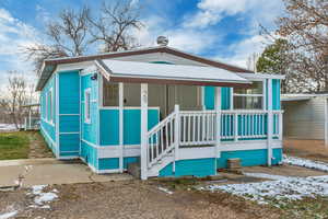 View of front of property featuring a porch