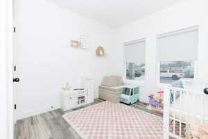 Bedroom featuring light wood-style floors