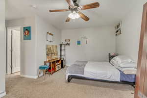 Bedroom 2 with carpet flooring and a ceiling fan