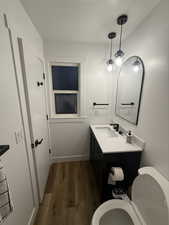 Bathroom #2 featuring vanity and dark wood-style floors