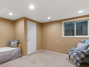 Bedroom featuring carpet and recessed lighting