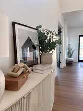 Detailed view of wood finished floors and baseboards