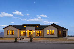 View of front facade with stone siding